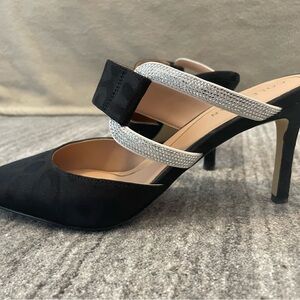 Black Cole Haan Sandal with decorative Silver embellishment.